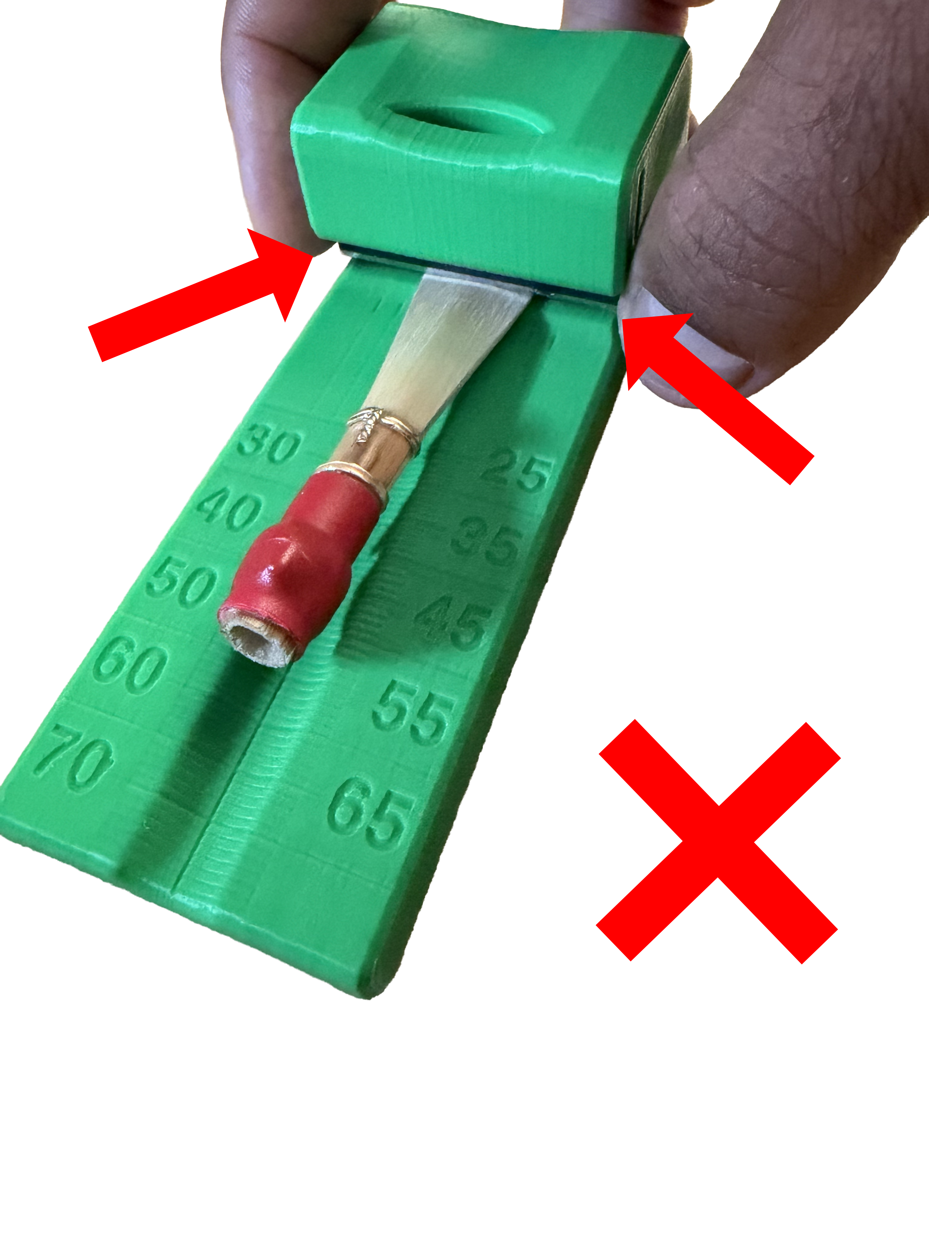 Illustration of the wrong way to grab on to the guillotine.