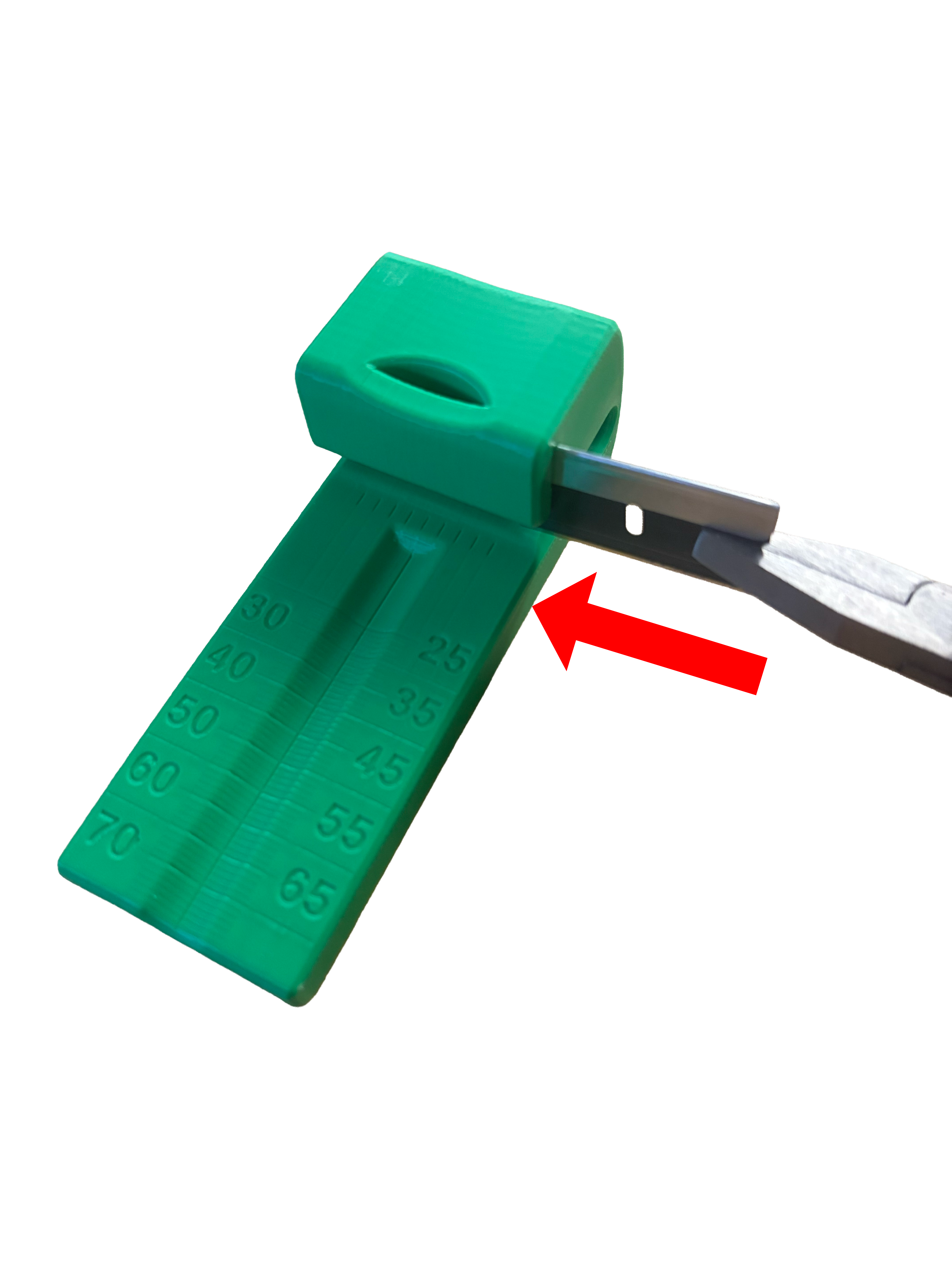 Pliers safely holding a razor blade for insertion into a tool